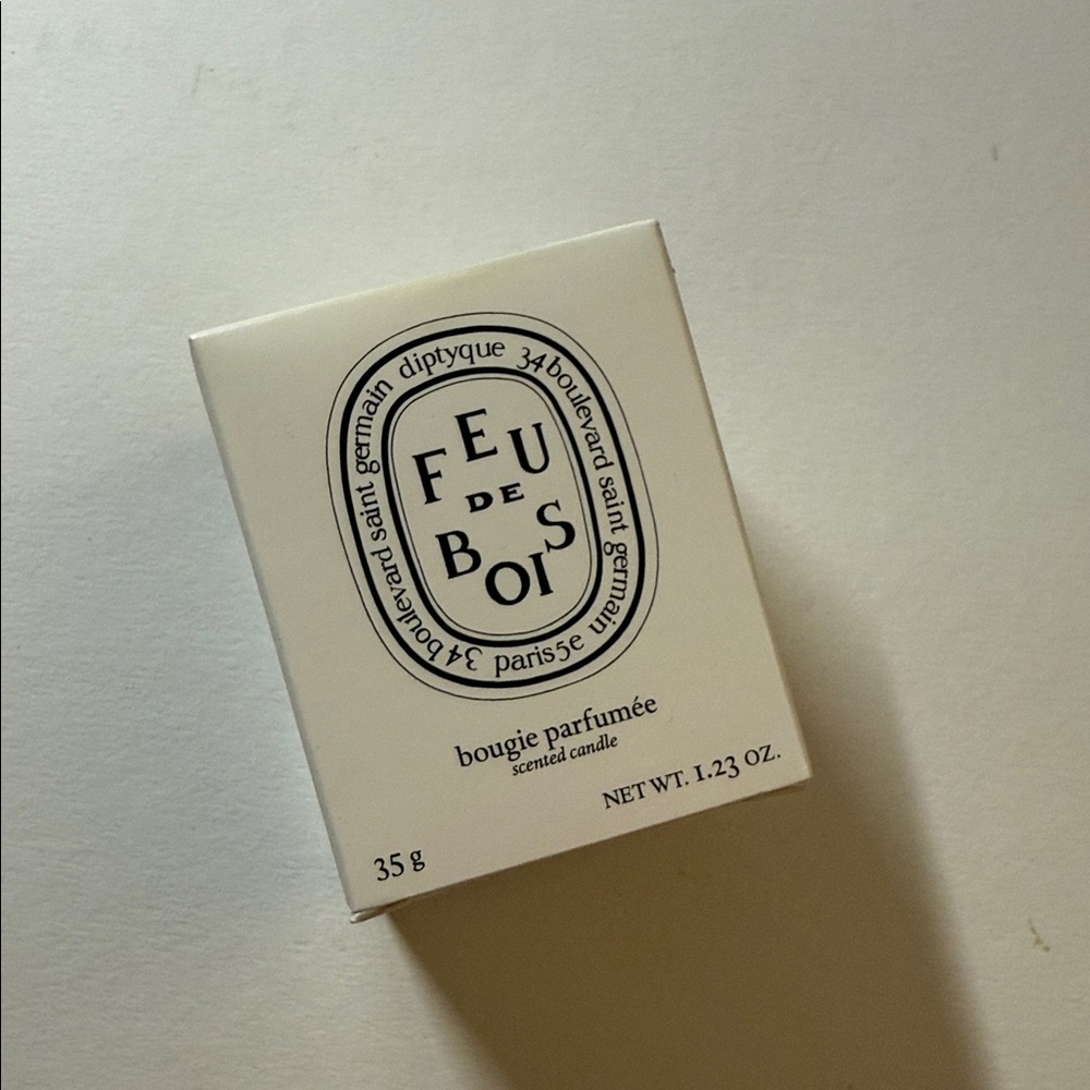 Diptyque Feu de Bois Candle in Classic White